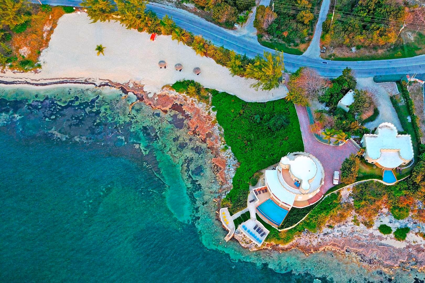 Cayman Castle + Guesthouse — luxury villa photo 1